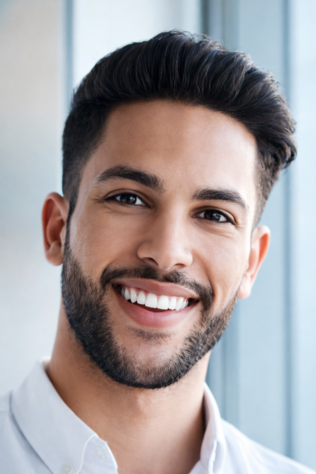 Smiling adult, illustrative of people who build a consistent daily wellness routine